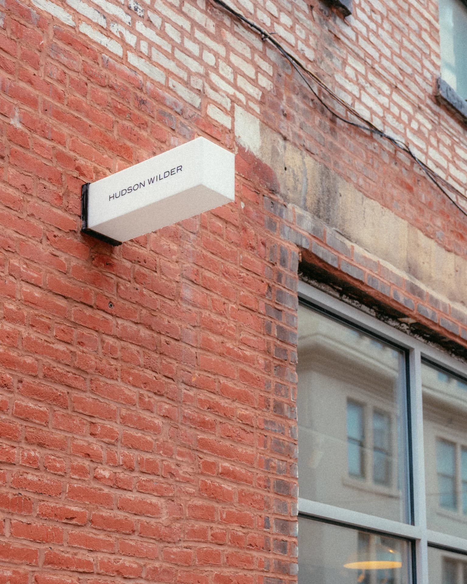 Hudson Wilder Sign