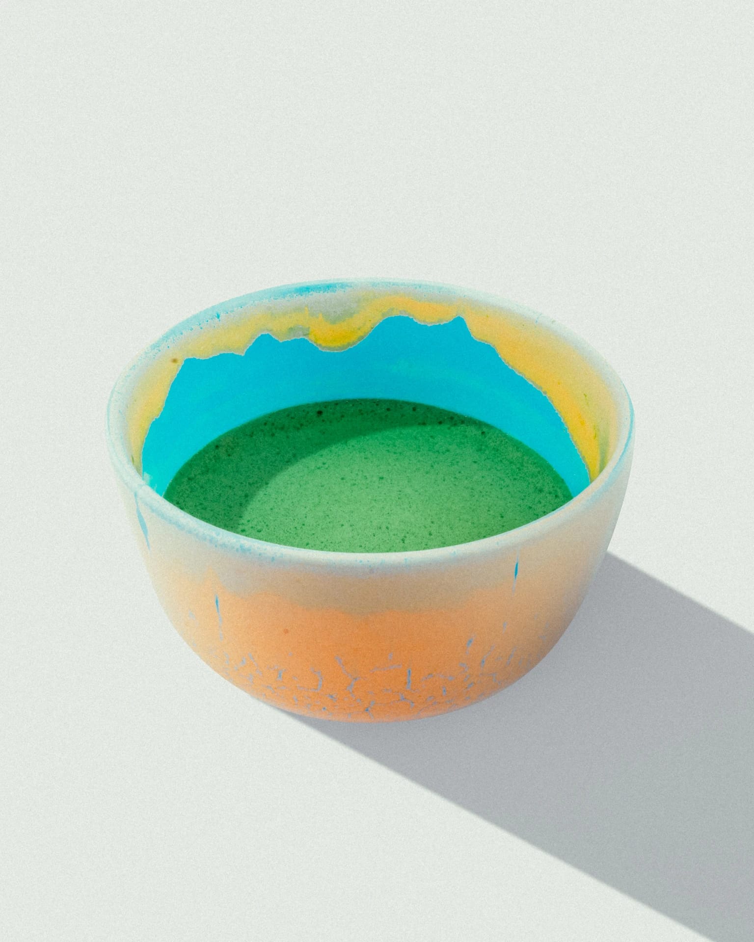 Ceremonial grade machine-milled matcha, angled view